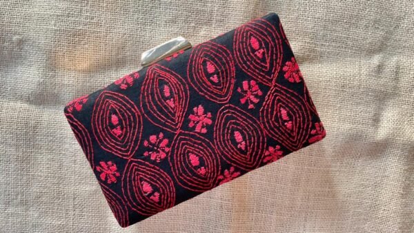 "Experience the Rich Cultural Heritage of India with Our Pink Kantha Clutch"