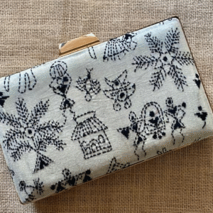 "Experience the Rich Cultural Heritage of India with Our White Kantha Clutch"