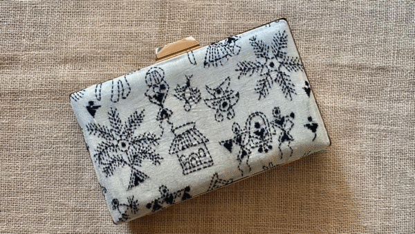 "Experience the Rich Cultural Heritage of India with Our White Kantha Clutch"