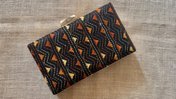 "Experience the Rich Cultural Heritage of India with Our Dark Brown Kantha Clutch"