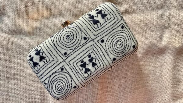 "Experience the Rich Cultural Heritage of India with Our Off White Kantha Clutch"