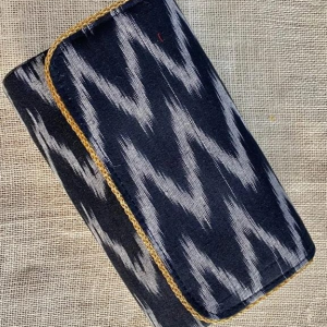 Fashion with a Purpose - with The black colour Ikkat Clutch