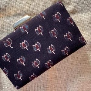 "Carry a Piece of Tradition Everywhere You Go with our Eggplant Purple Ajrakh Clutch"