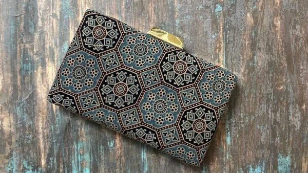 "Carry a Piece of Tradition Everywhere You Go with our Gray Ajrakh Clutch"