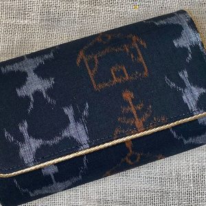 "Indulge in the allure of Dark Navy Blue Sambalpuri elegance, held in the palm of your hand."