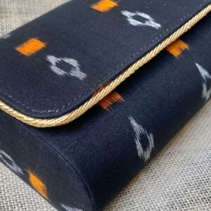 "Experience the fusion of tradition and style with our Dark Navy Blue Sambalpuri clutch masterpieces."