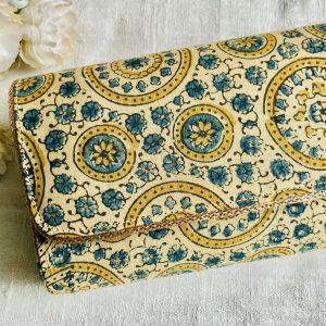 "Carry a Piece of Tradition Everywhere You Go with our Off White Ajrakh Clutch"