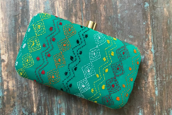 Experience the Rich Cultural Heritage of India with Our Jade Green Kantha Clutch